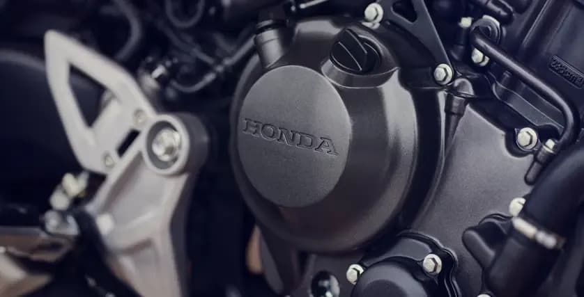 A single-cylinder DOHC four-valve Engine